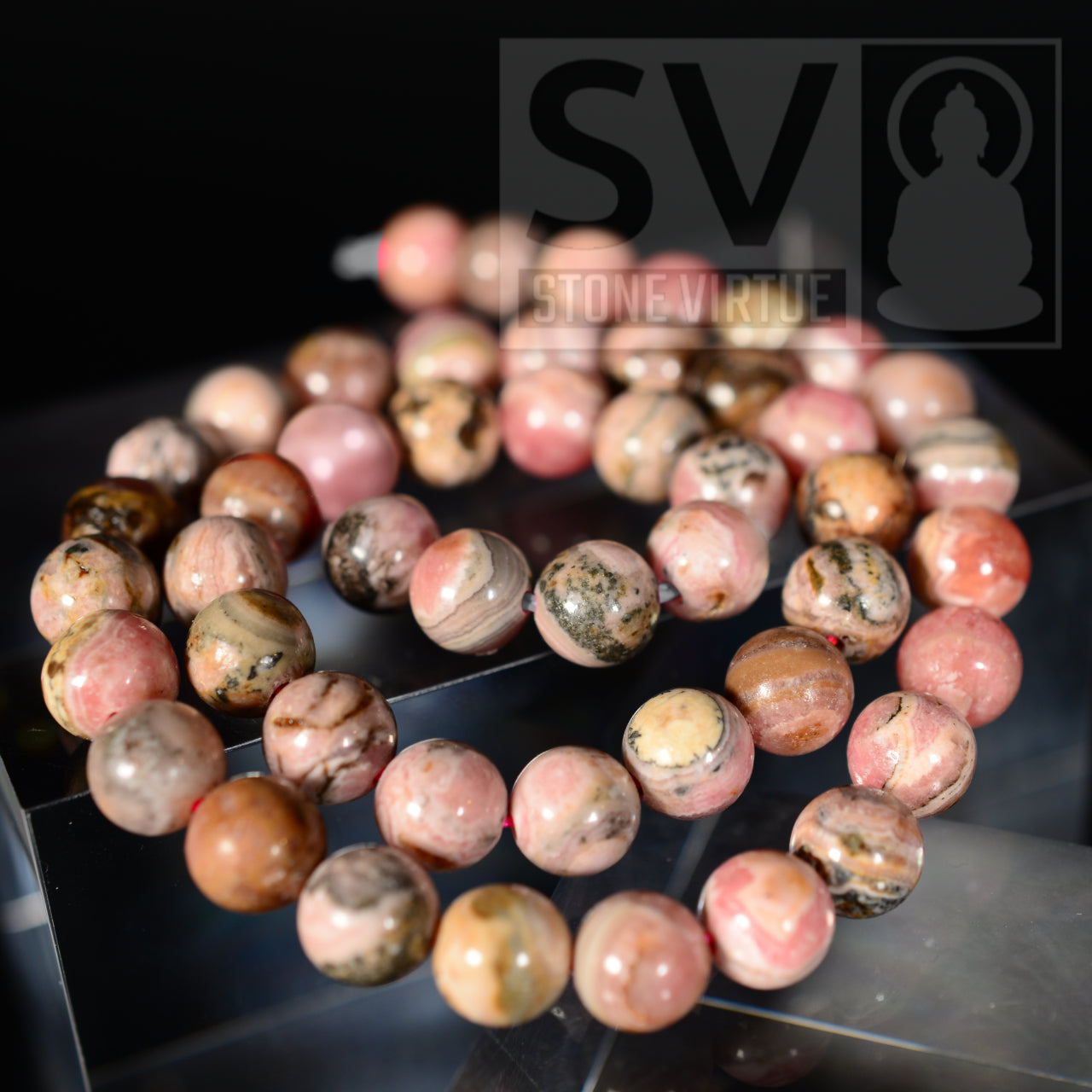 8mm natural Rhodochrosite bead, known for fostering love, compassion, and emotional healing, promoting joy and self-worth.