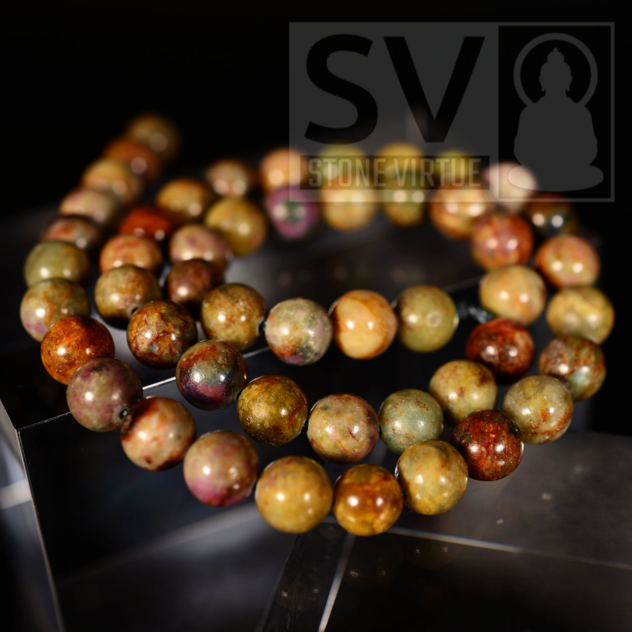 8mm natural Fuschite (Ruby) bead, known for its rejuvenating properties, promoting healing, heart-opening, and emotional resilience.