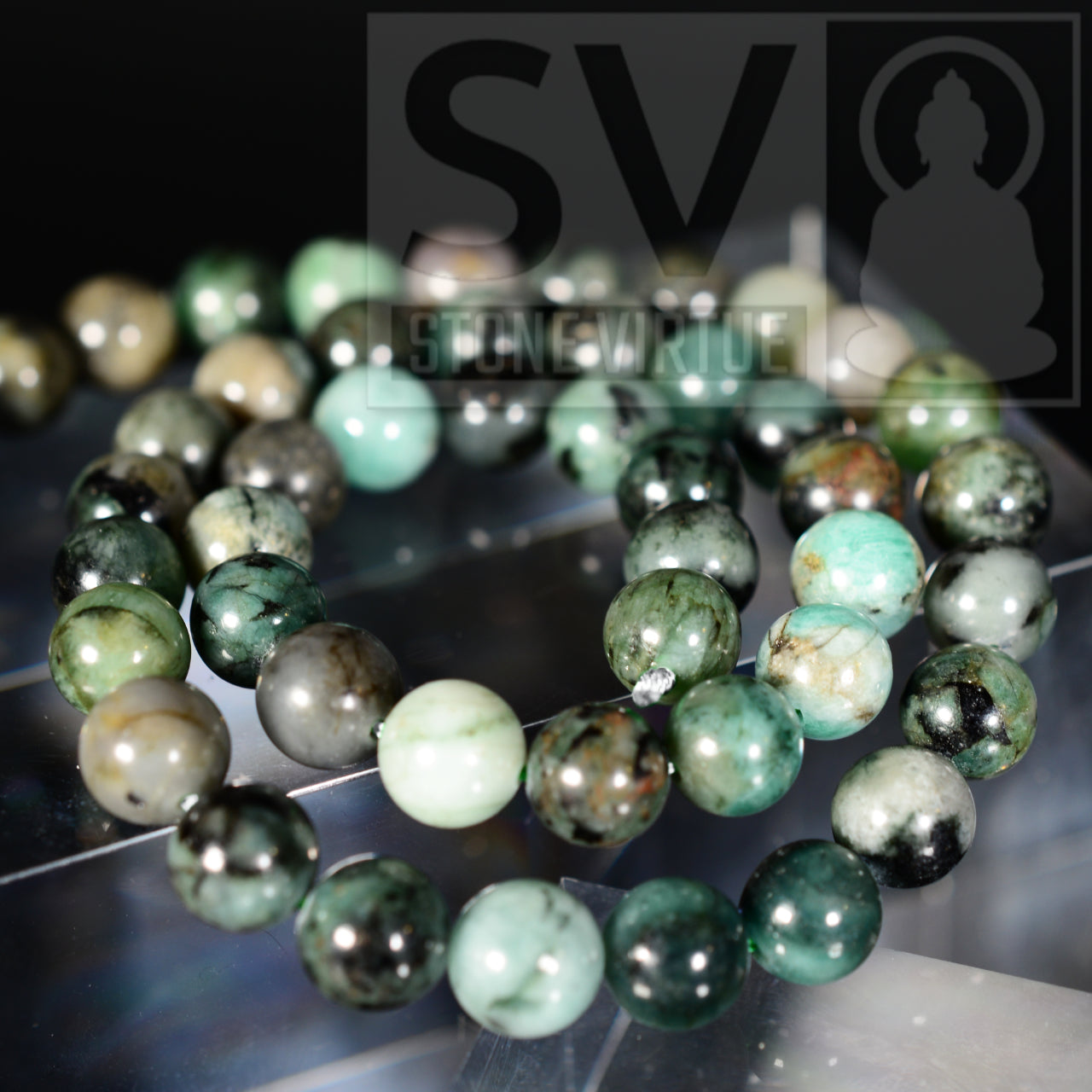 8mm natural Emerald bead, revered for its healing properties, enhancing love, compassion, and emotional balance.