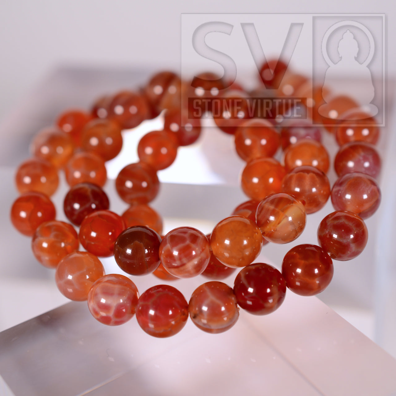 8mm natural Fire Agate bead, associated with protection, passion, and energy, fostering a sense of security and vitality.