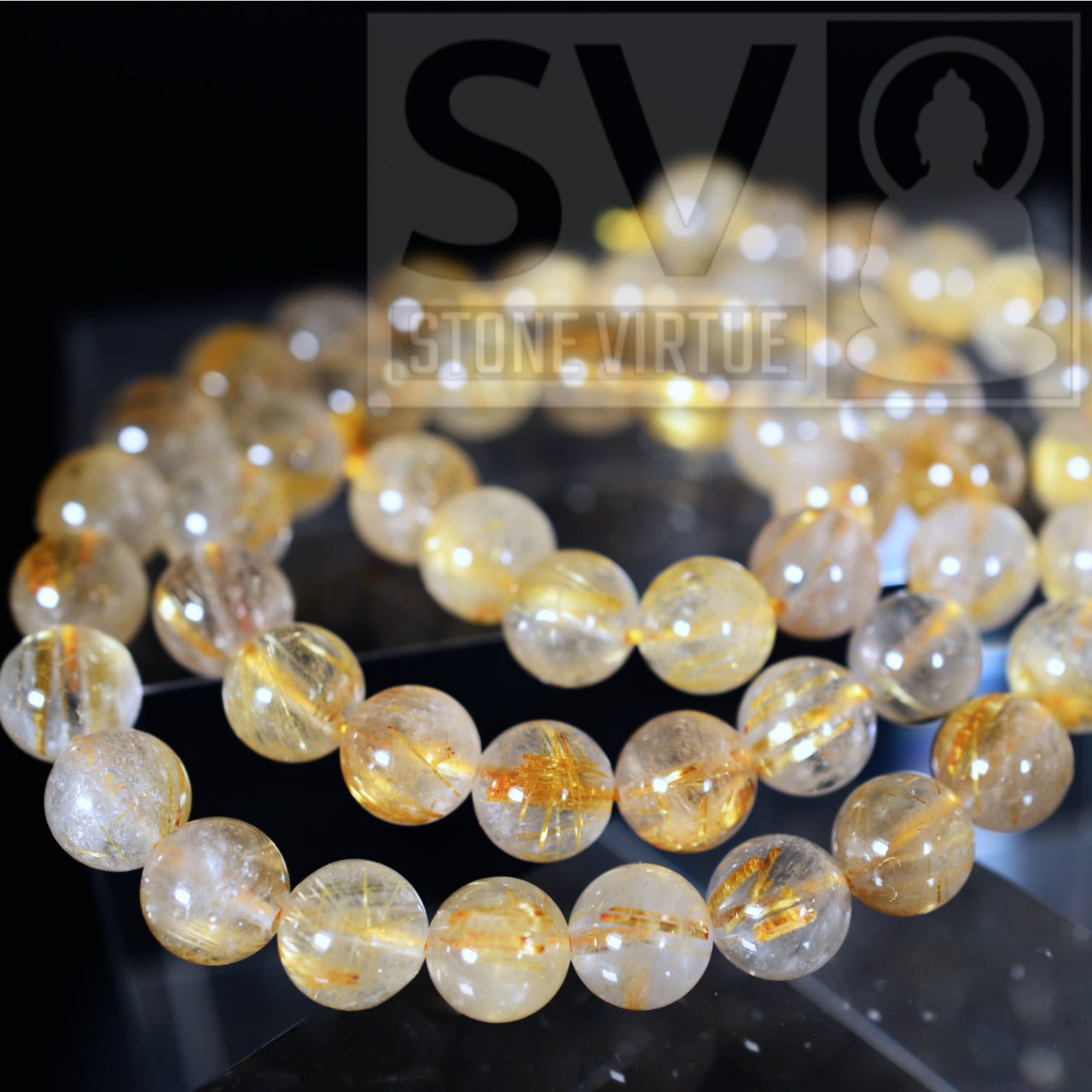 8mm natural Golden Rutilated Quartz bead, known for amplifying intentions, enhancing clarity, and supporting manifestation.