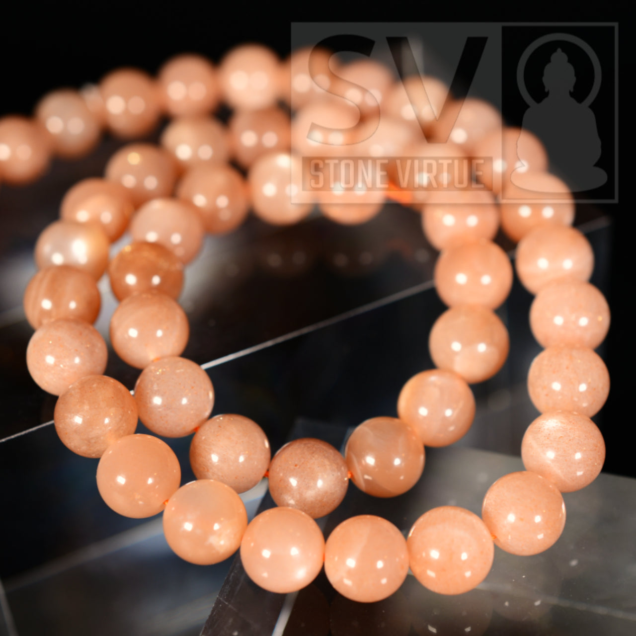 8mm natural Peach Moonstone bead, associated with soothing emotions, encouraging compassion, and nurturing the heart and soul.
