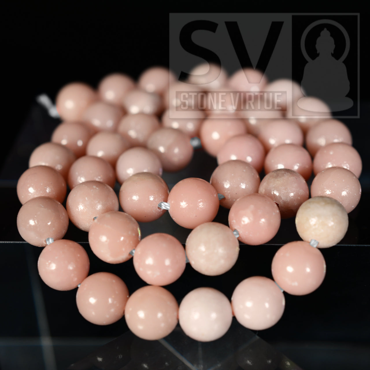 8mm natural Pink Opal bead, known for promoting emotional healing, love, and compassion, supporting a sense of calm.
