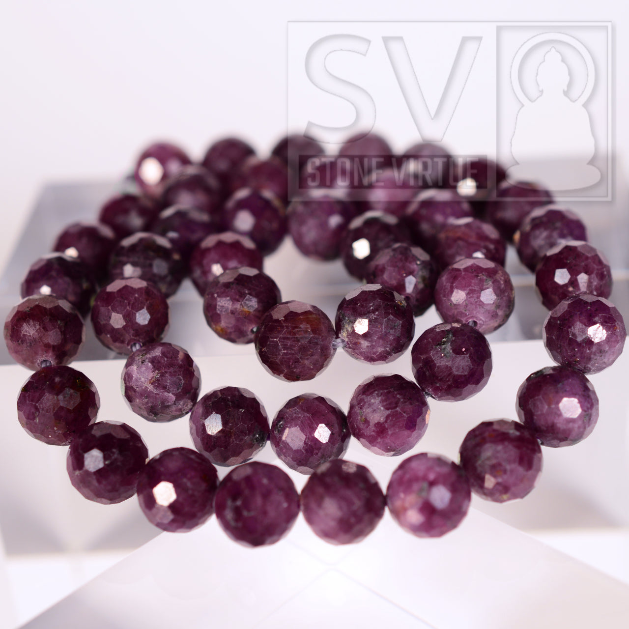 8mm faceted natural Ruby bead, known for its vitality, passion, and courage, enhancing love and energizing the spirit.
