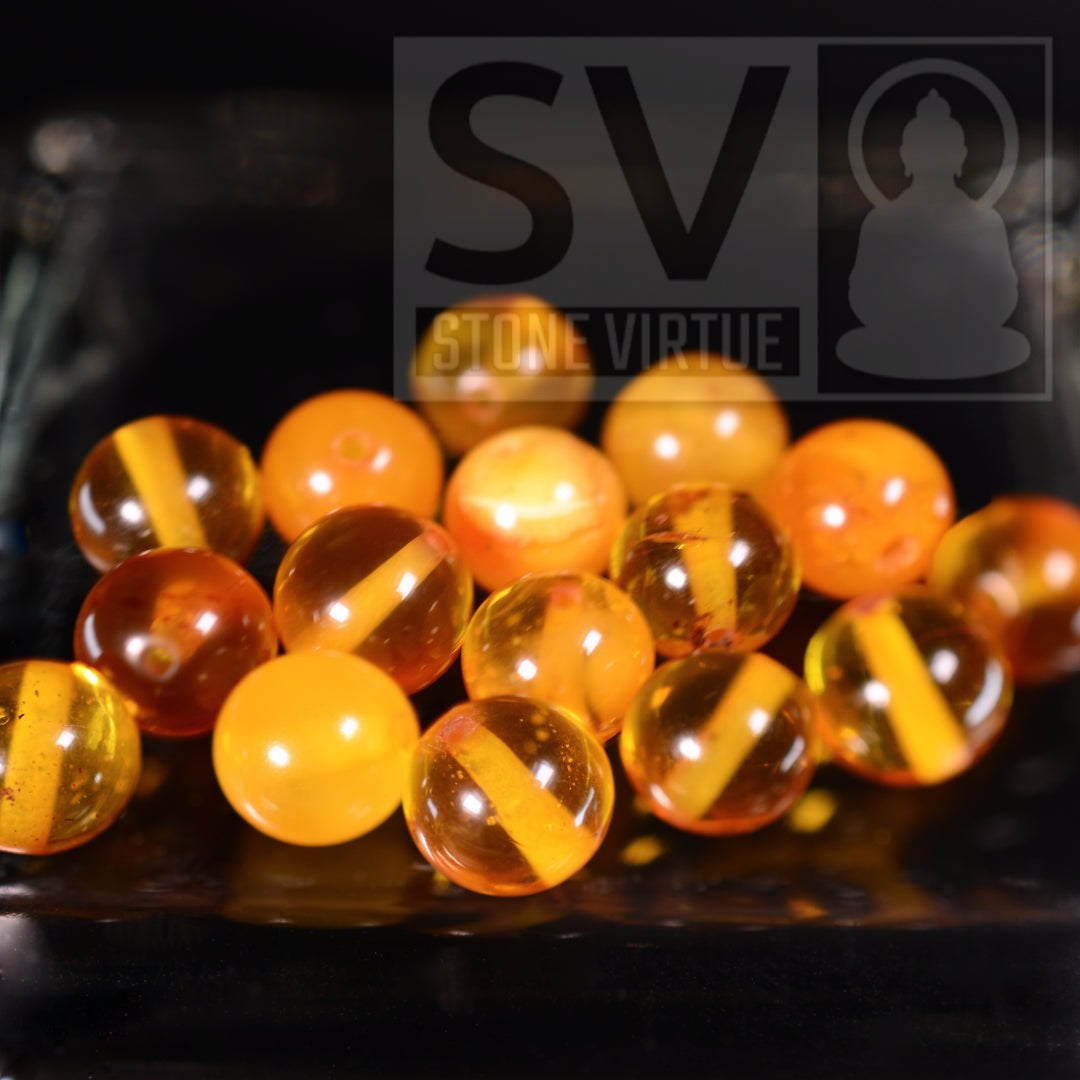 8mm natural Amber beads, valued for its soothing energy, known to cleanse negative energies and inspire calmness and renewal.