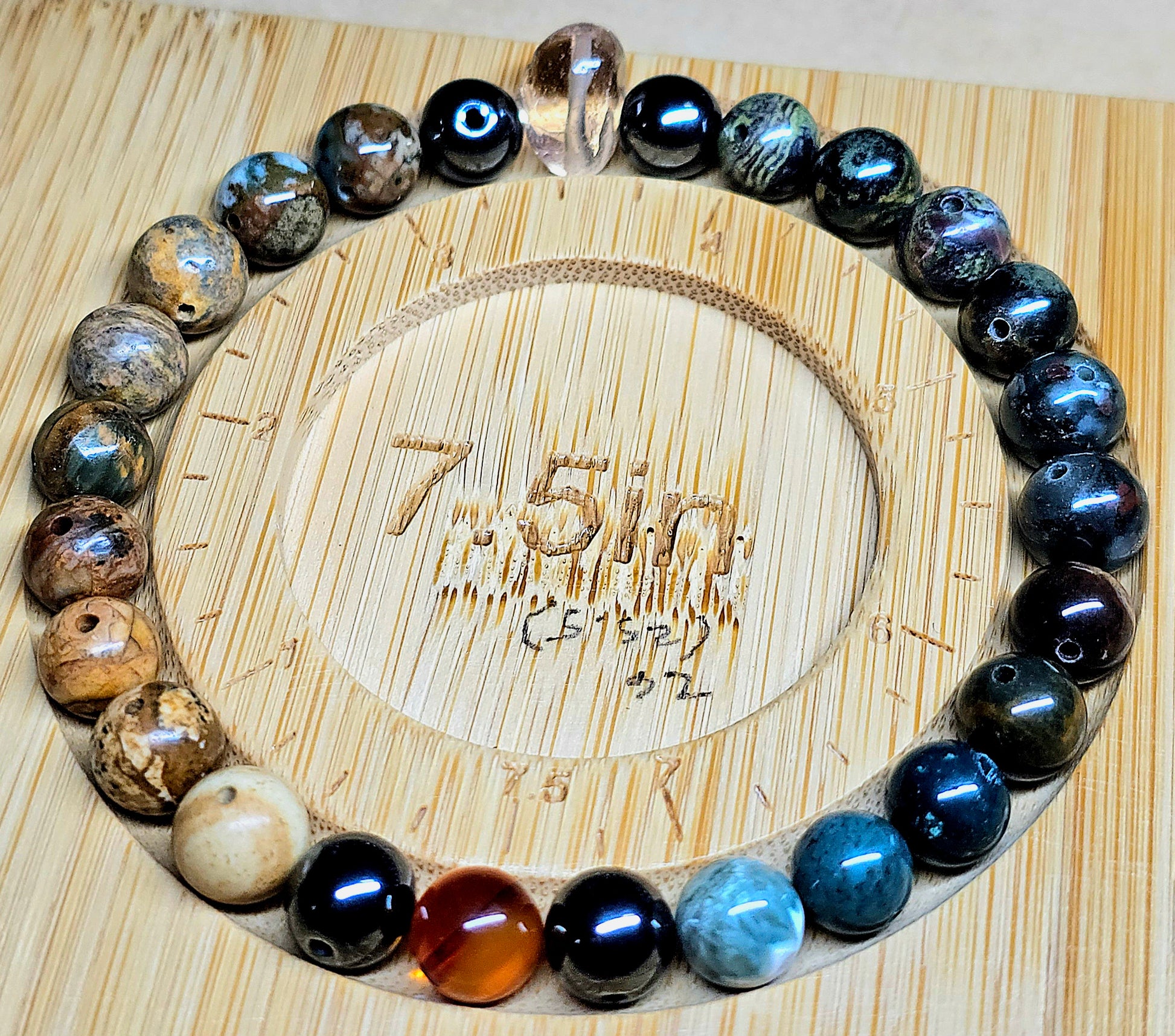 Custom bracelet designed with gemstones renowned for their supportive properties for physical well-being and vitality.