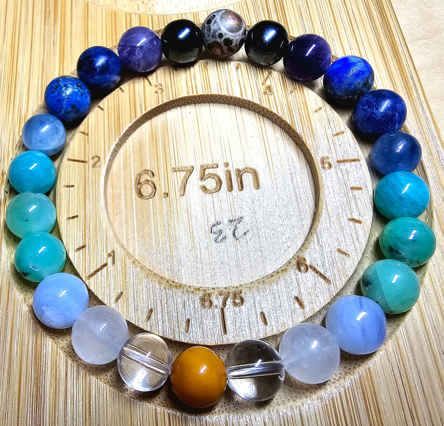 Custom bracelet designed with gemstones renowned for their supportive properties for physical well-being and vitality.